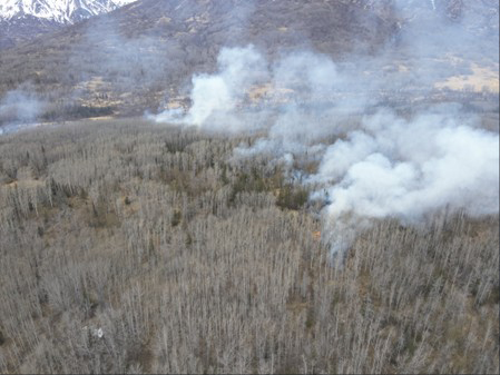 The first day of the fire May 18 at about 5 in the afternoon with smoke dispersing to the Northeast There are no spot fires outside project boundaries Dronemounted infrared cameras were used after the fire to monitor residual heat and confirm containment objectives
